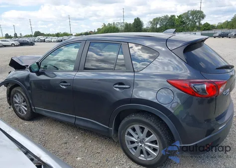 2015 Mazda Cx-5 Touring z USA, uszkodzony, nr VIN JM3KE4CY2F0519912